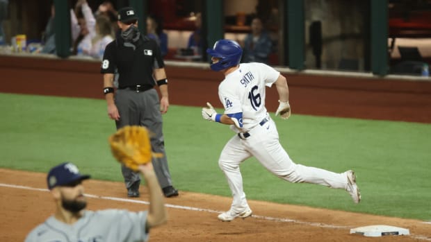 Oct 21, 2020; Arlington, Texas, USA; Los Angeles Dodgers catcher Will Smith (16) rounds the bases after hitting a solo homerun in the 6th inning against the Tampa Bay Rays in game two of the 2020 World Series at Globe Life Field. Mandatory Credit: Kevin Jairaj-USA TODAY Sports